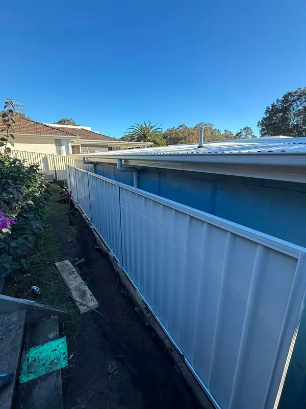 New Colorbond fence running along a side boundary